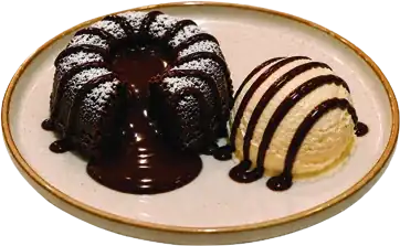 Chocolate lava cake with a molten centre, served with vanilla ice cream.